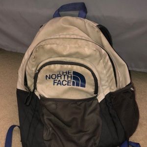 Cream/purple Northface Backpack